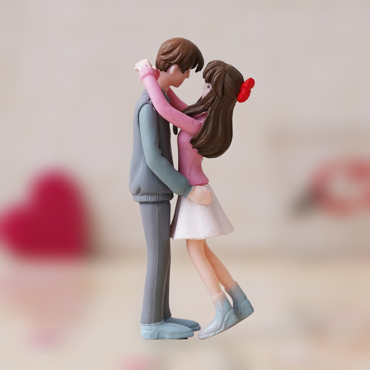 Grey & Pink Hugging Couple Figurine